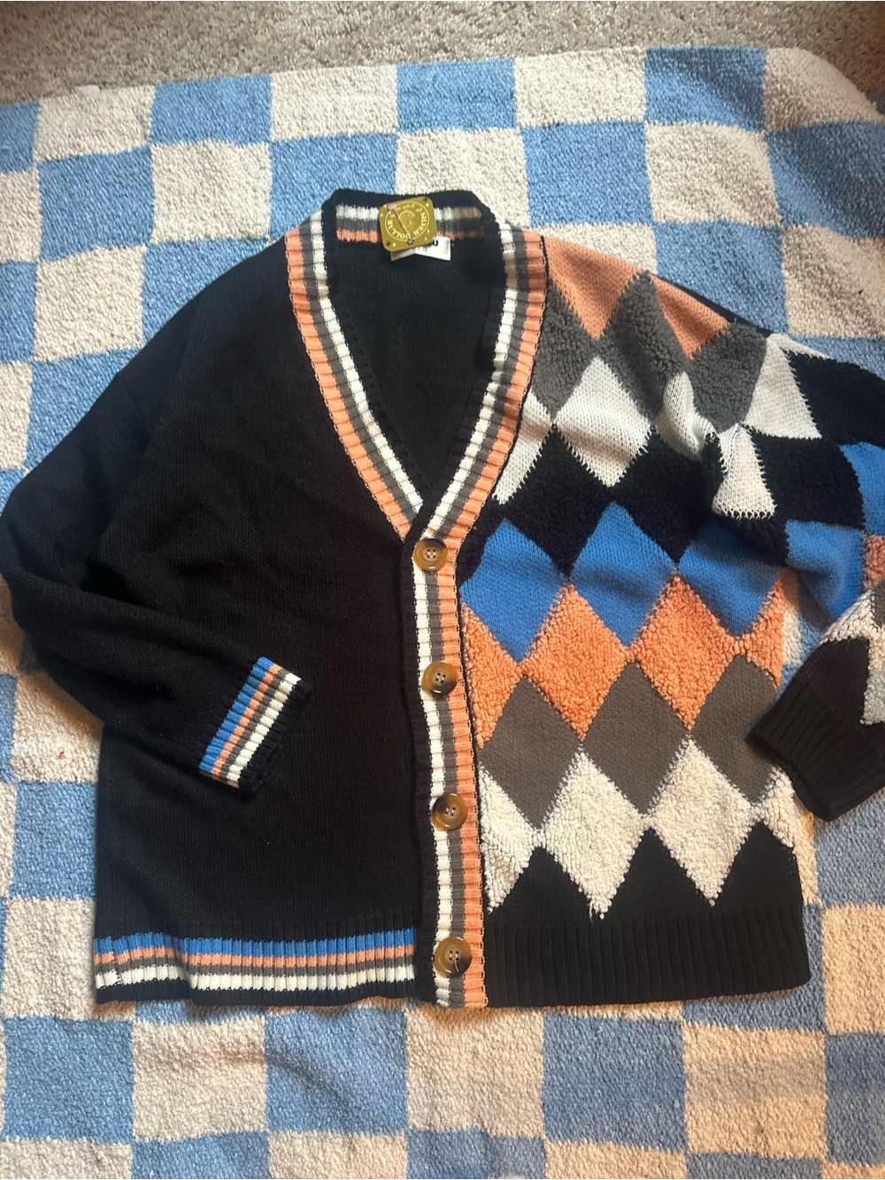 Black Argyle/ diamond cardigan. Howls moving castle vibes